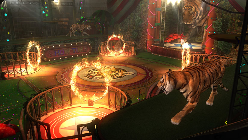 Imagen de un circo con aros de fuego y tigres